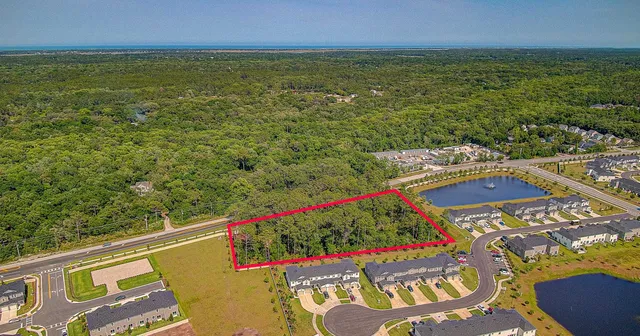 a view of a balcony with two chairs and a table