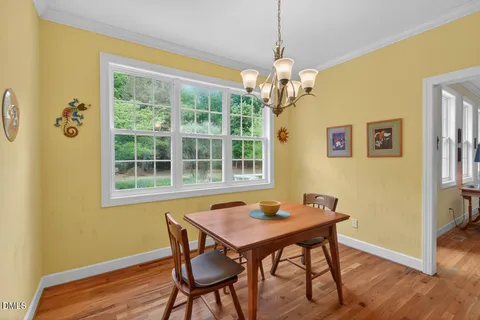 a kitchen with stainless steel appliances granite countertop wooden cabinets a stove top oven a sink and dishwasher