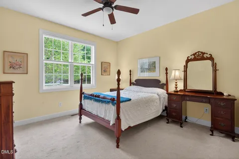a view of a livingroom with a ceiling fan
