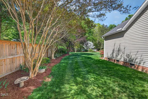an aerial view of house with yard