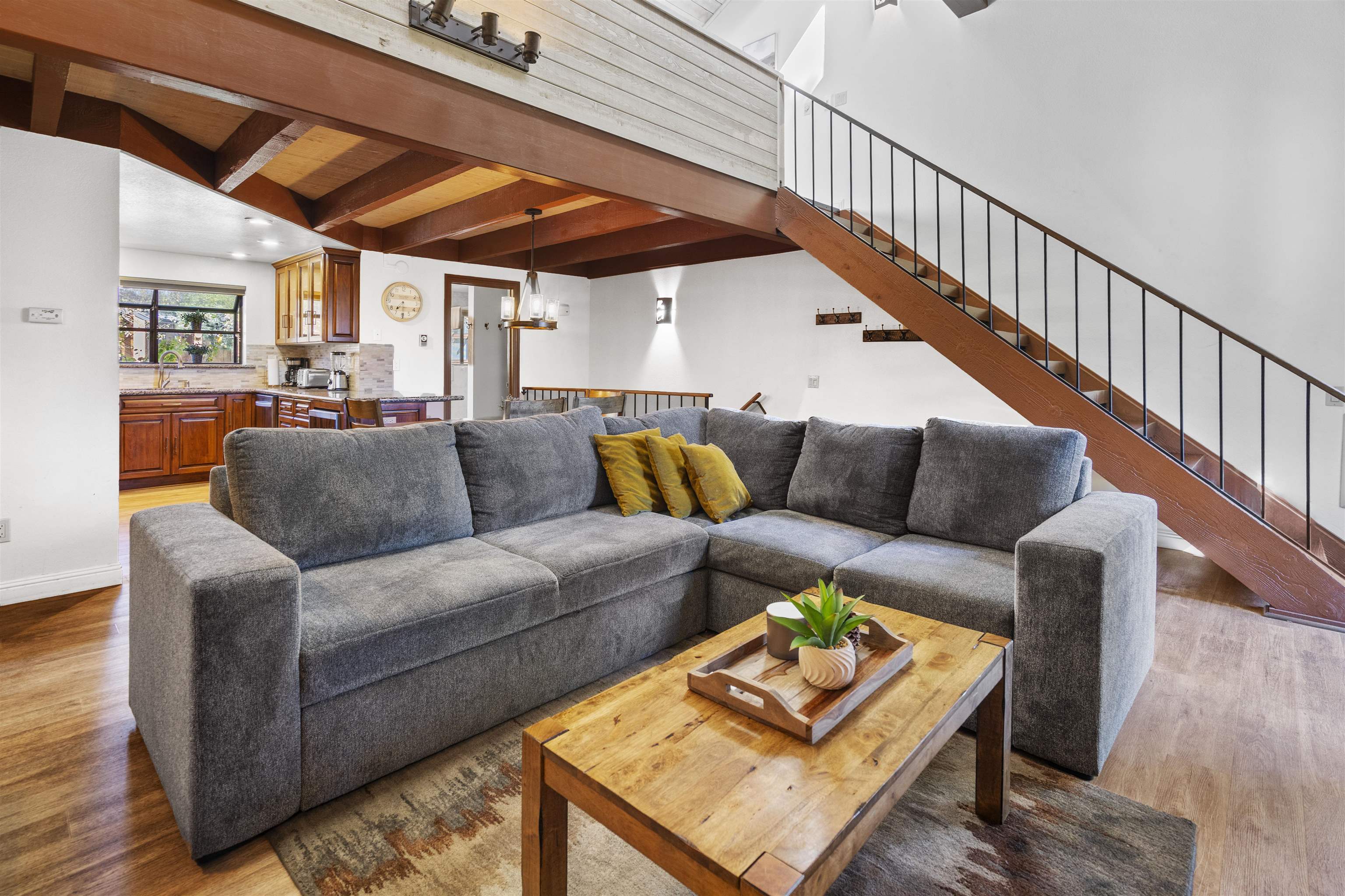 4710 Minaret Road, Unit 3 Mammoth Lakes, CA 93546 - Photo 1 of 30 a living room with furniture and a wooden floor