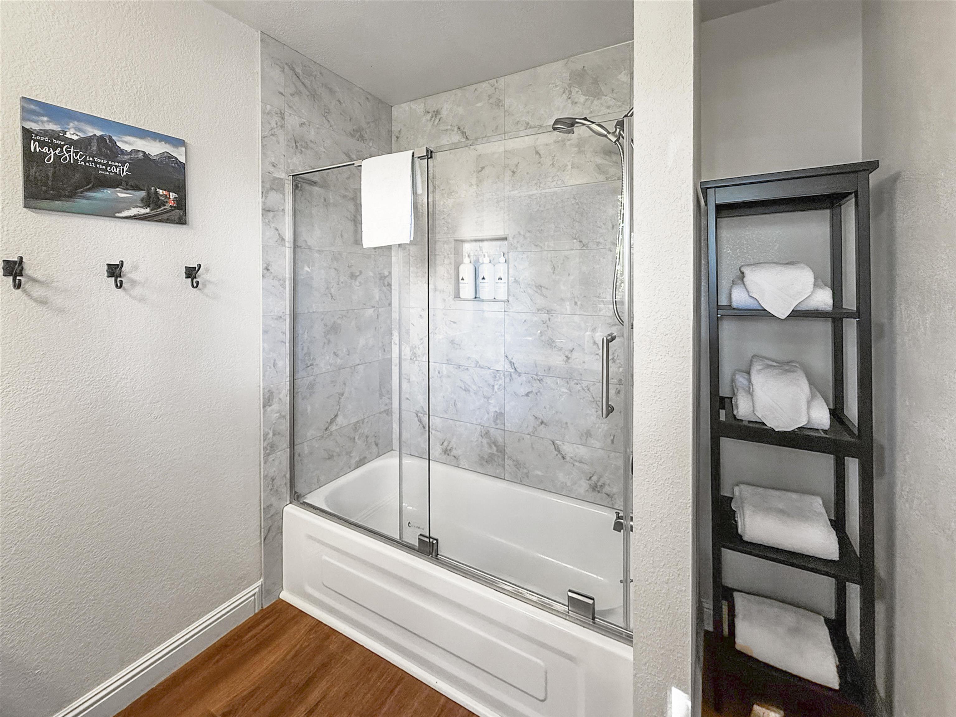 4710 Minaret Road, Unit 3 Mammoth Lakes, CA 93546 - Photo 20 of 30 a bathroom with a bathtub and a shower