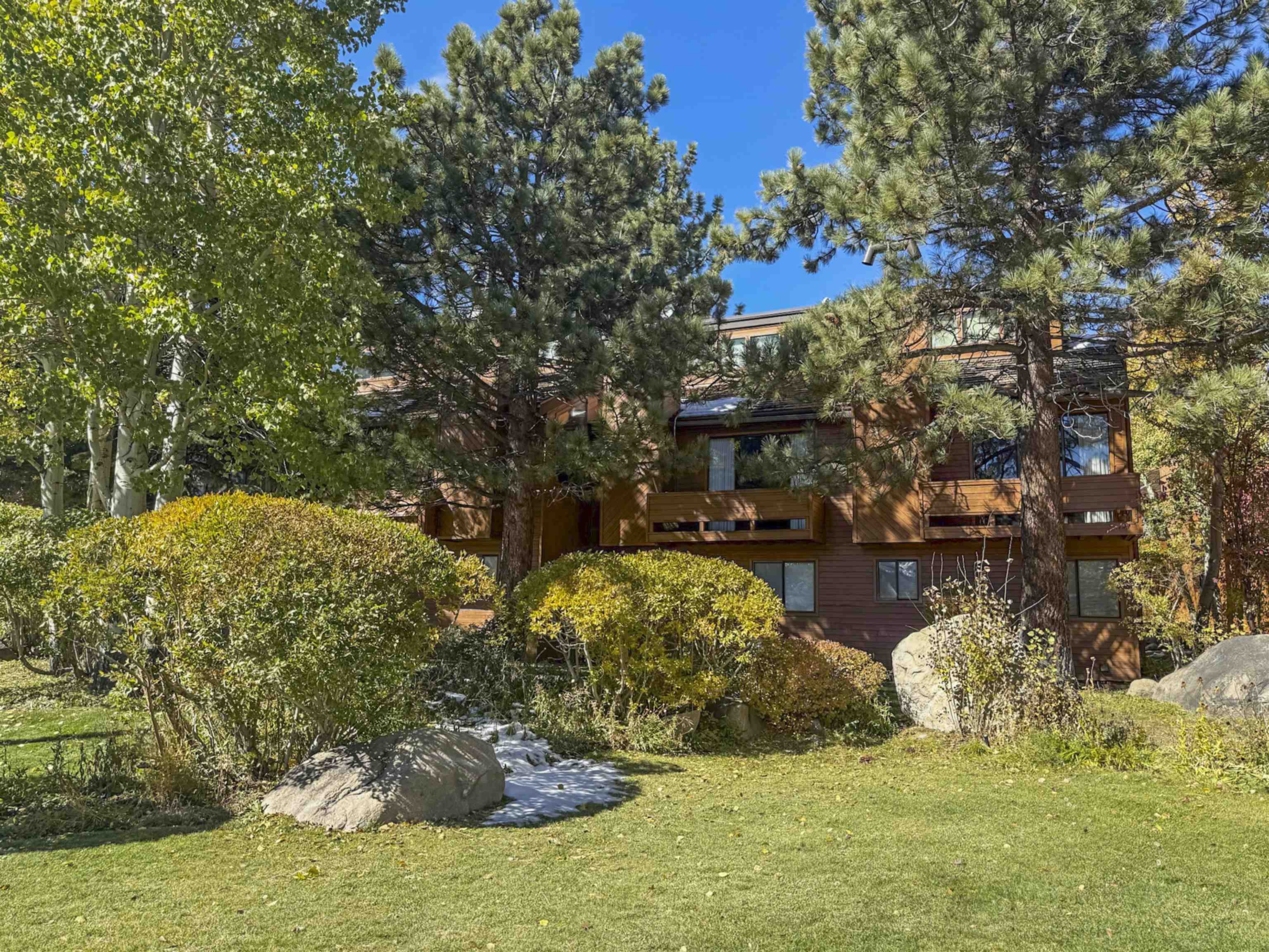 4710 Minaret Road, Unit 3 Mammoth Lakes, CA 93546 - Photo 26 of 30 a view of a lake with houses