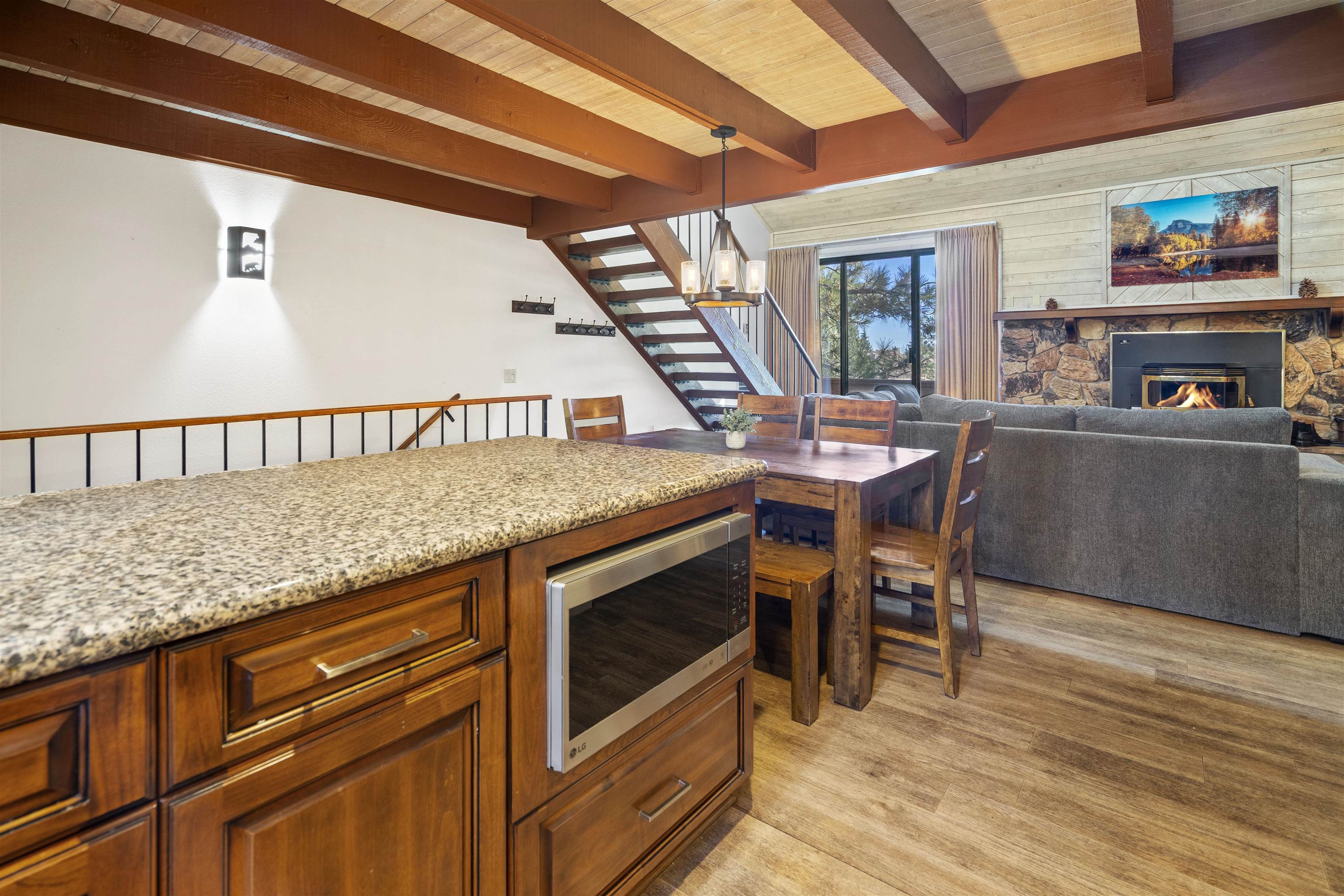 4710 Minaret Road, Unit 3 Mammoth Lakes, CA 93546 - Photo 4 of 30 a living room with furniture and a fireplace
