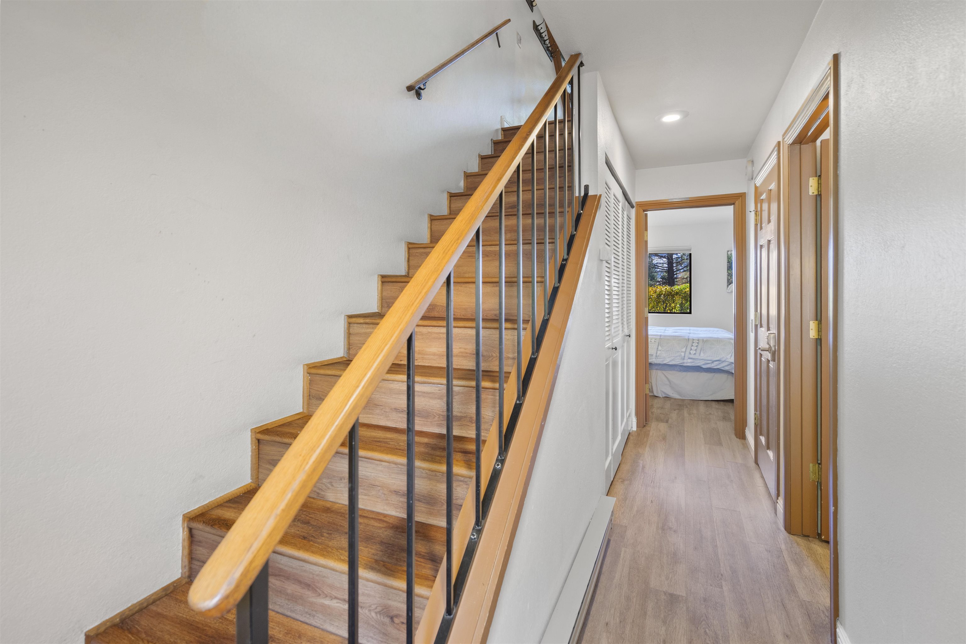 4710 Minaret Road, Unit 3 Mammoth Lakes, CA 93546 - Photo 10 of 30 a view of staircase with wooden floor and stairs