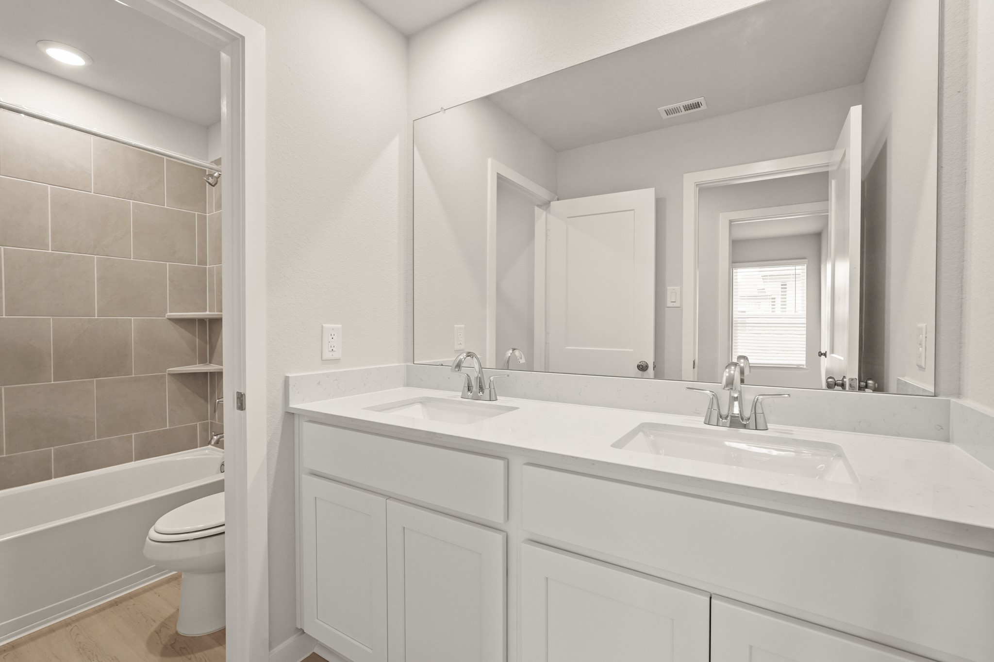 113 Rising Cedar Lane Hockley, TX 77447 - Photo 21 of 27 a bathroom with a sink a toilet and shower