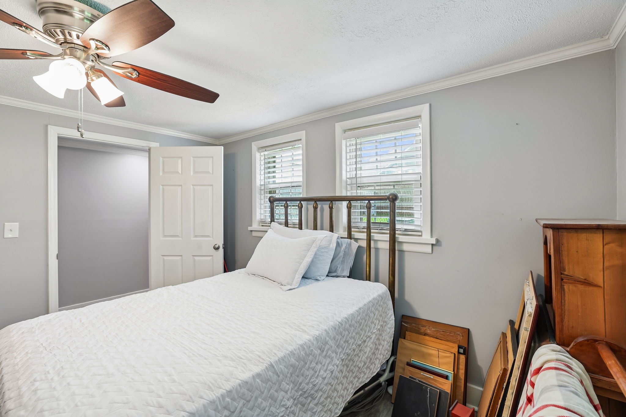 1466 Bible Crossing Road Winchester, TN 37398 - Photo 30 of 42 a bedroom with a bed and a chandelier