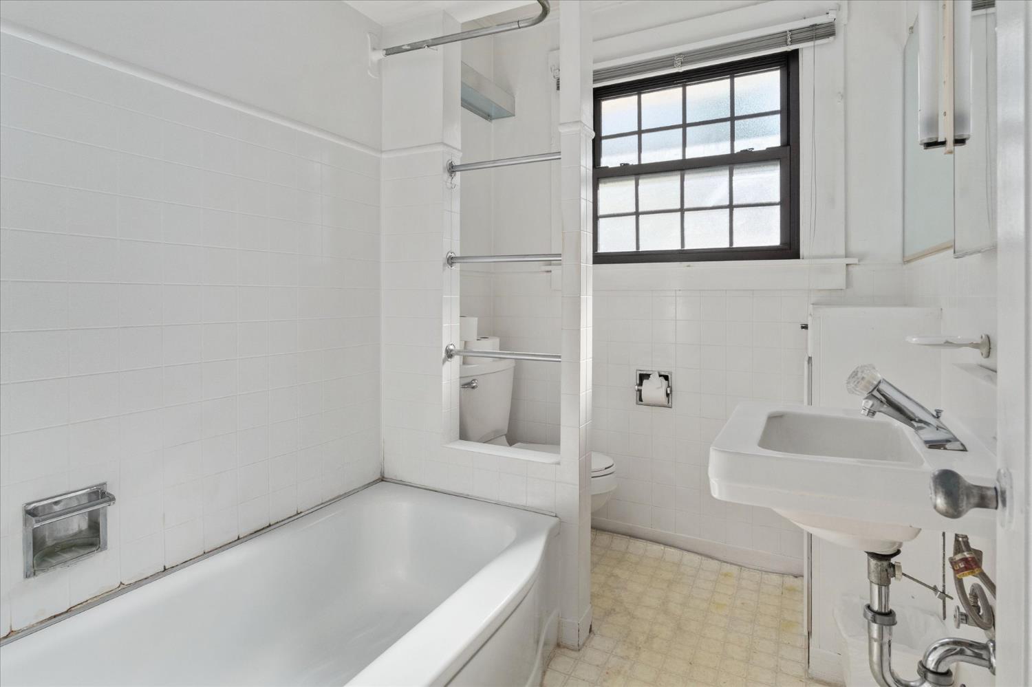 1575 South Main Street Angels Camp, CA 95222 - Photo 28 of 39 a bathroom with a bathtub and a sink