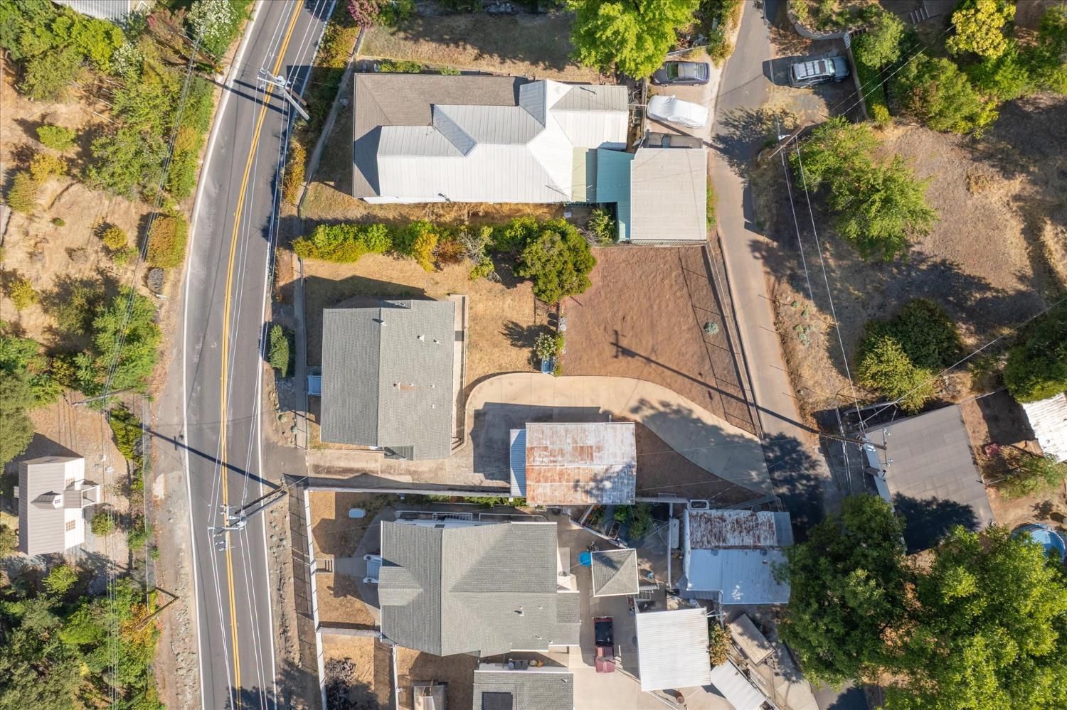 1575 South Main Street Angels Camp, CA 95222 - Photo 36 of 39 an aerial view of residential houses with outdoor space