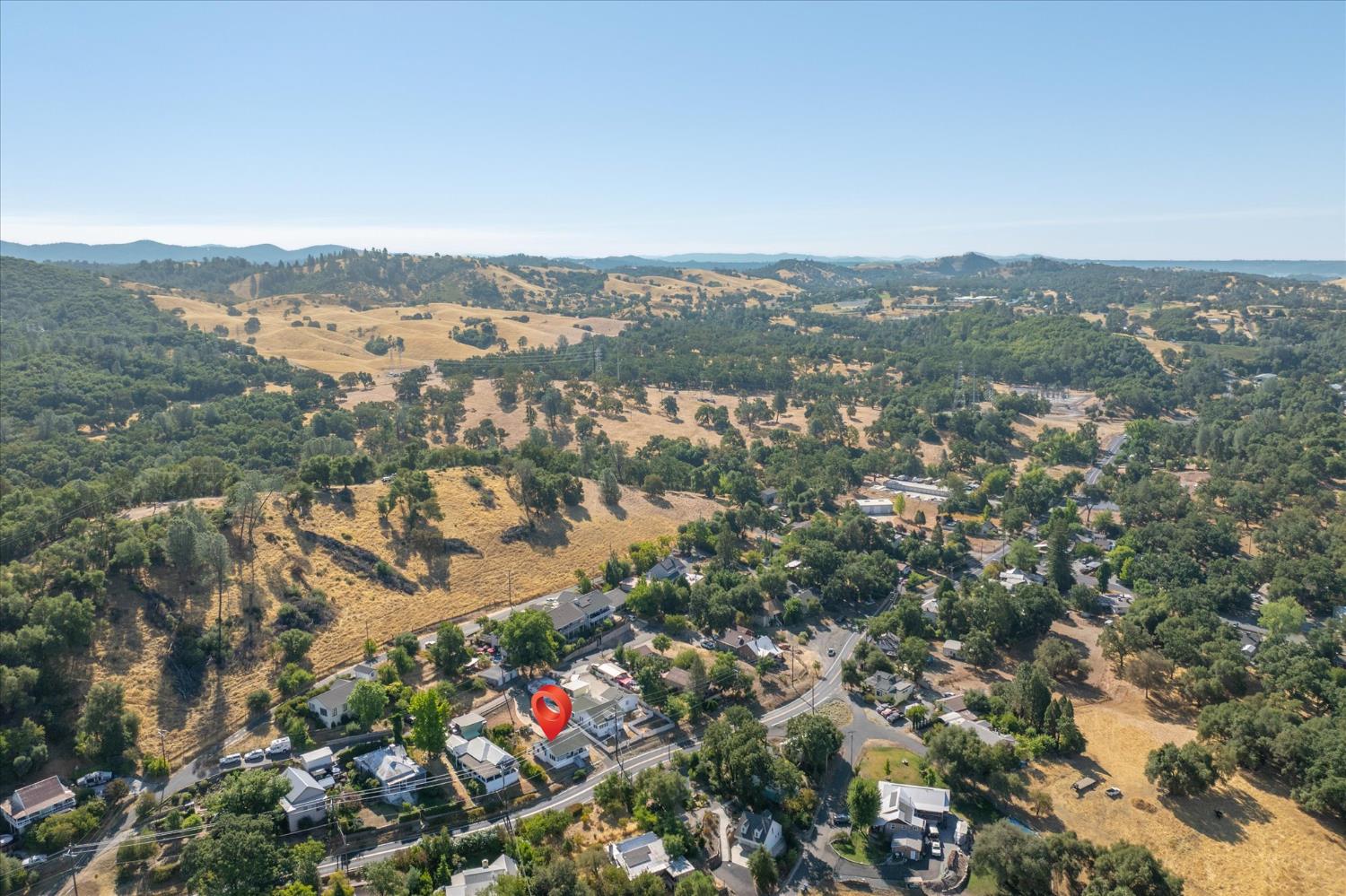 1575 South Main Street Angels Camp, CA 95222 - Photo 37 of 39 an aerial view of residential building and trees around
