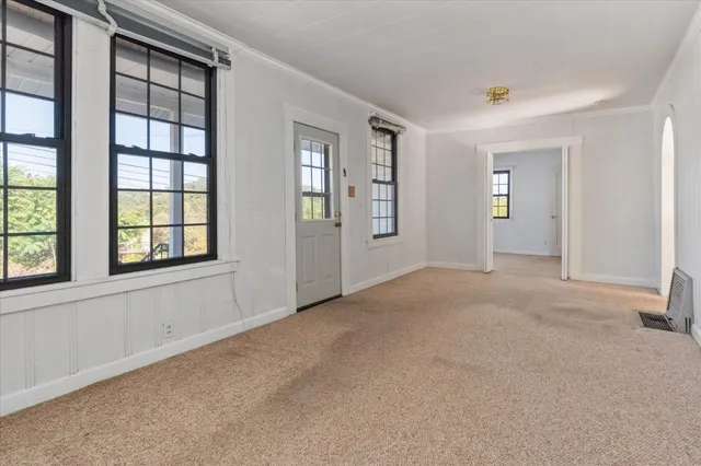 an empty room with windows