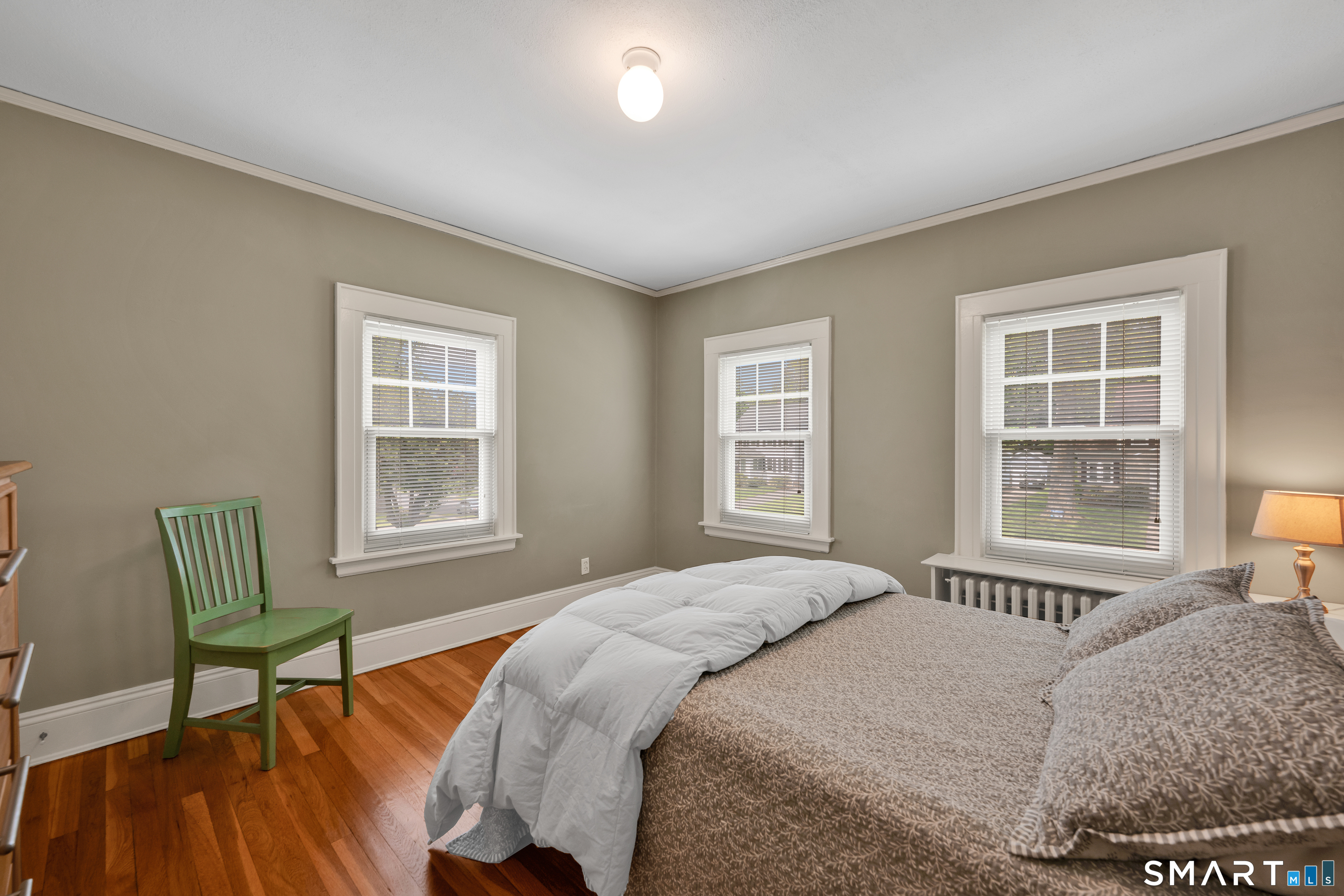 44 Beverly Road Wethersfield, CT 06109 - Photo 18 of 31 a bedroom with a bed and a window