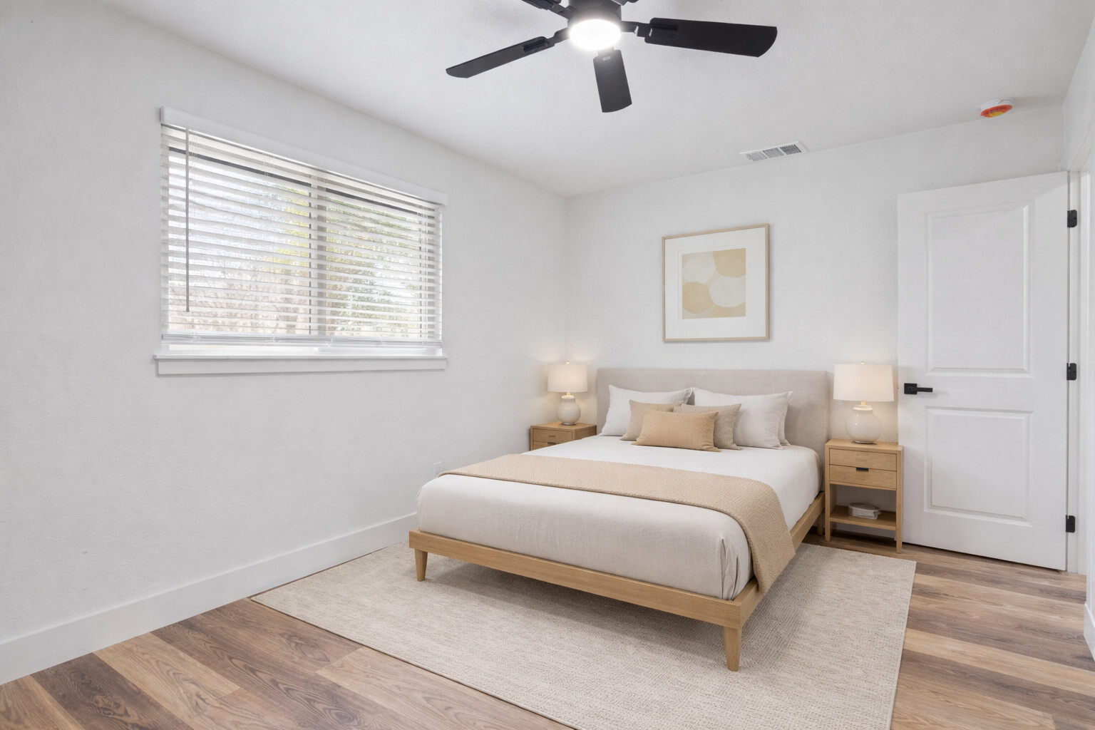 6212 Boxcar Run Austin, TX 78745 - Photo 15 of 36 Bedroom featuring light wood-type flooring and ceiling fan