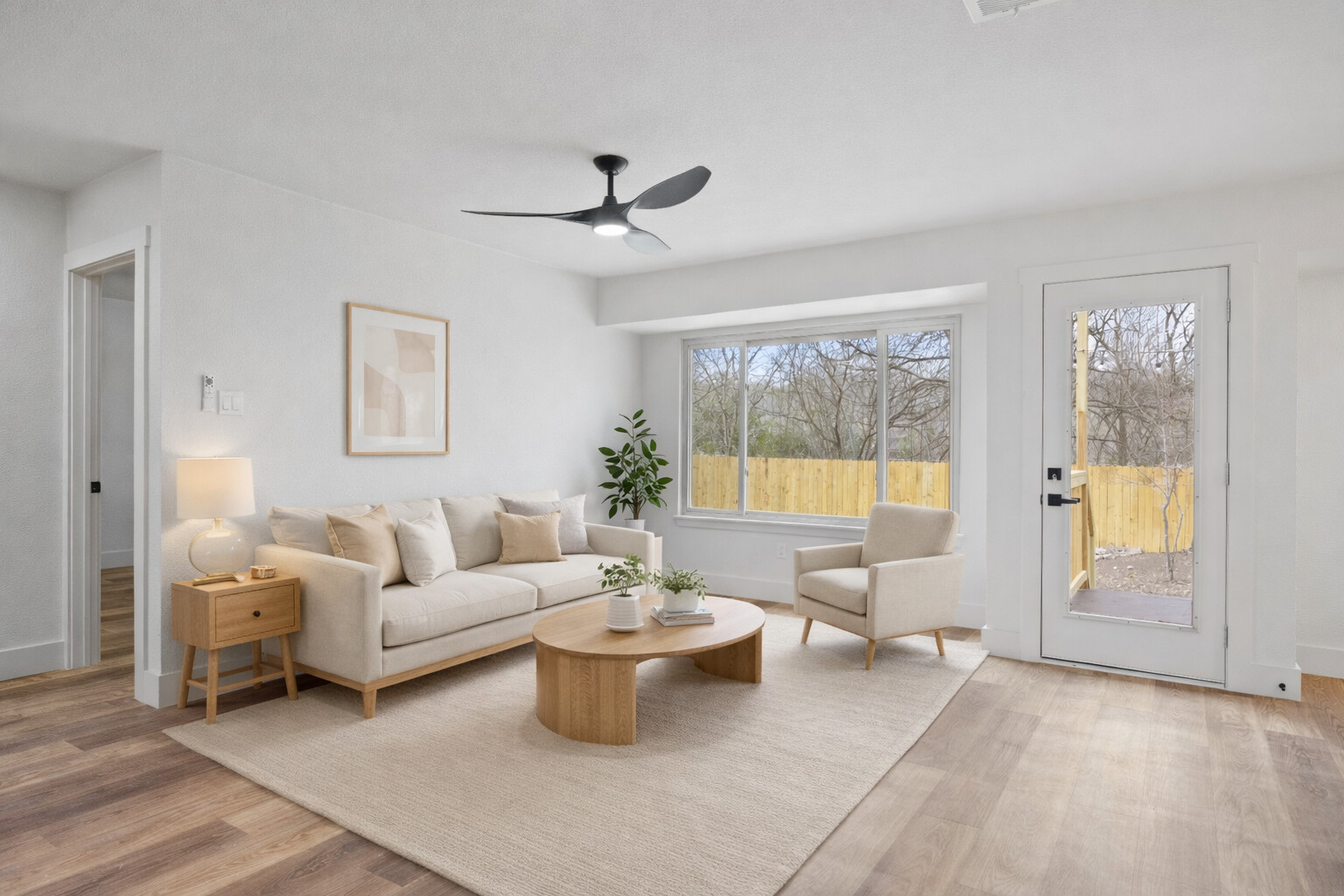 6212 Boxcar Run Austin, TX 78745 - Photo 5 of 36 Living area with a ceiling fan and light wood-style flooring