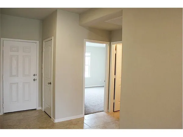 a view of a livingroom and a bathroom