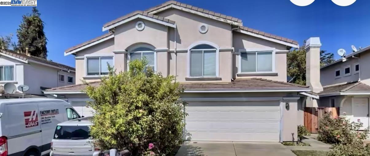 35418 Ratto Place Fremont, CA 94536 - Photo 1 of 1 a front view of a house with garden