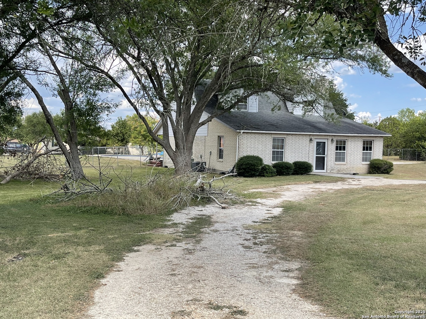6932 Green Valley Road Cibolo, TX 78108 - Photo 2 of 18 a front view of a house with a yard