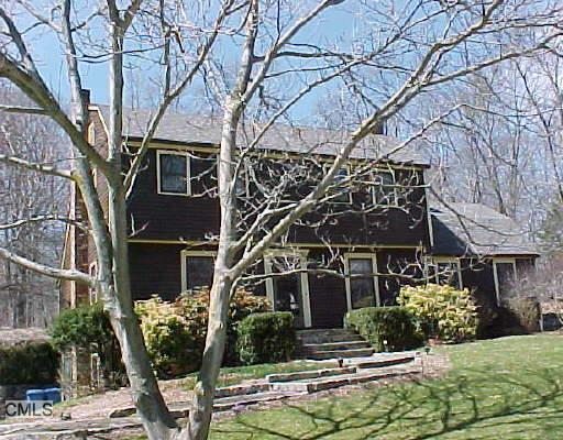 11 White Gate Road Oxford, CT 06478 - Photo 1 of 1 a front view of a house with garden