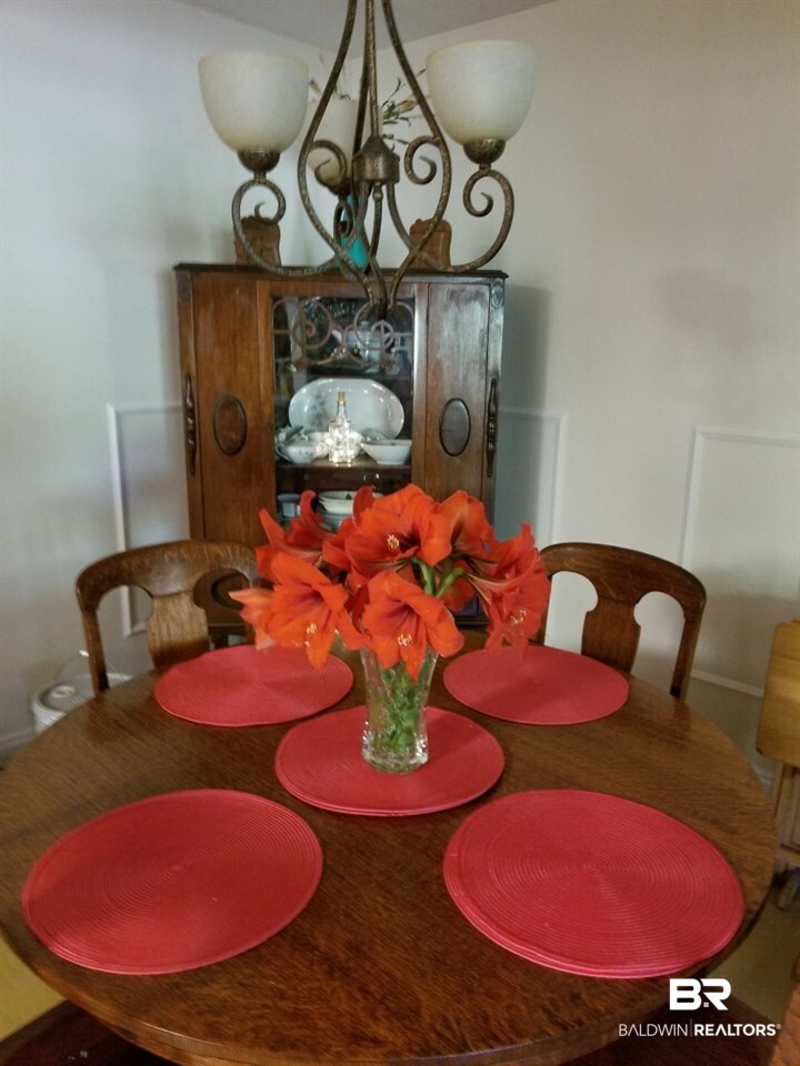22691 Pineview Lane Foley, AL 36535 - Photo 14 of 26 Dining Rm w Spring Flower