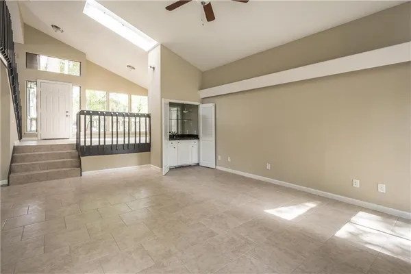 a view of an empty room with a window