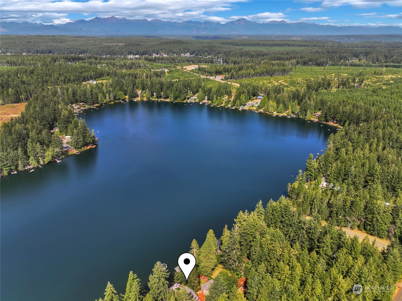 a view of a lake with a mountain in the background