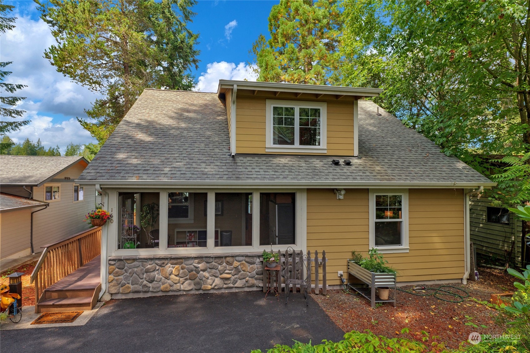 160 East Benson Lake Road Grapeview, WA 98546 - Photo 12 of 34 a view of a house with a yard