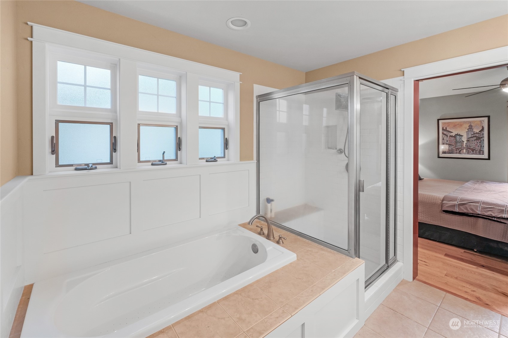 160 East Benson Lake Road Grapeview, WA 98546 - Photo 19 of 34 a bathroom with a tub and a shower