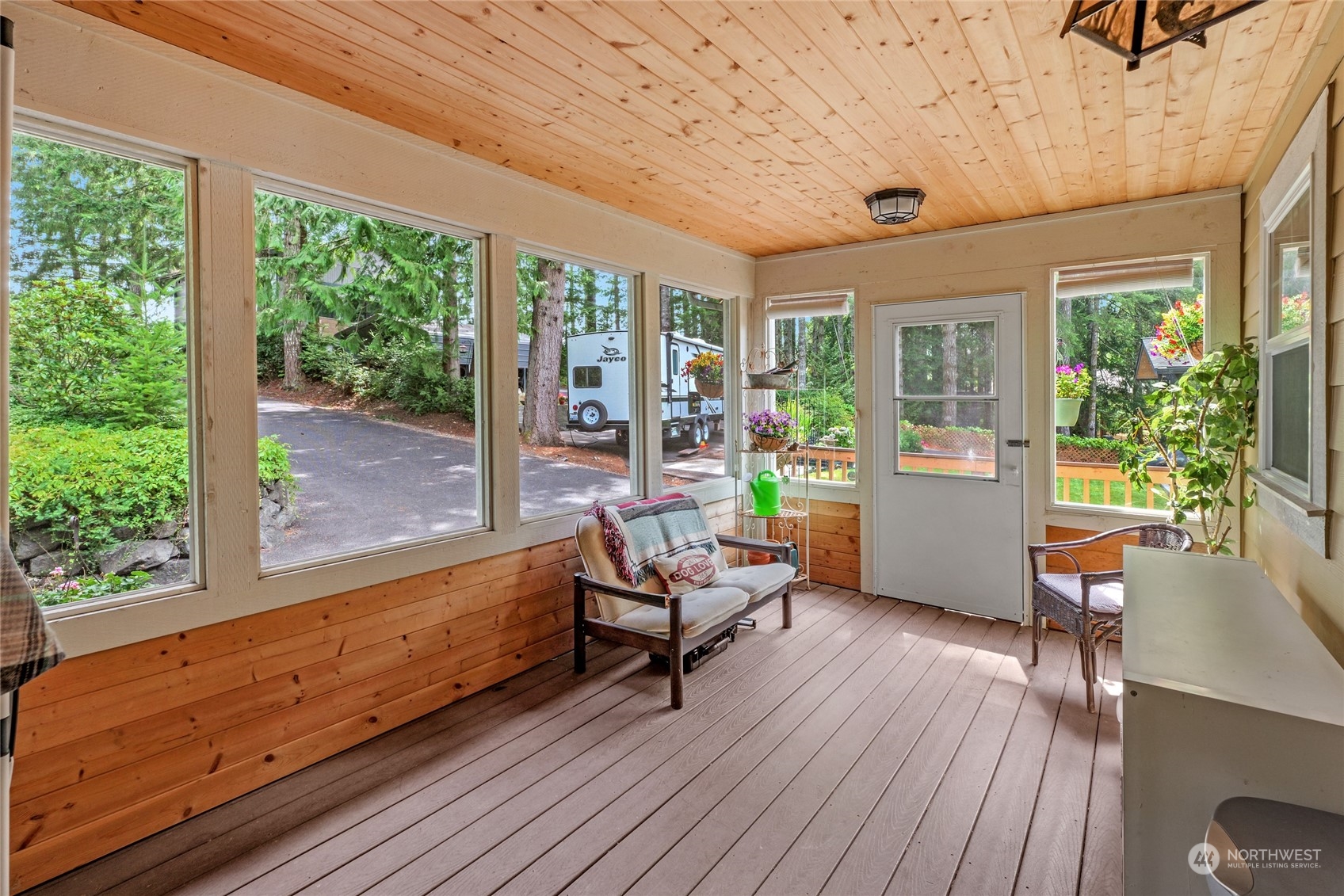 160 East Benson Lake Road Grapeview, WA 98546 - Photo 26 of 34 a living room with furniture and windows