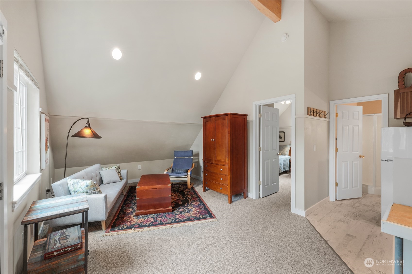 160 East Benson Lake Road Grapeview, WA 98546 - Photo 28 of 34 a living room with furniture a refrigerator and a sink