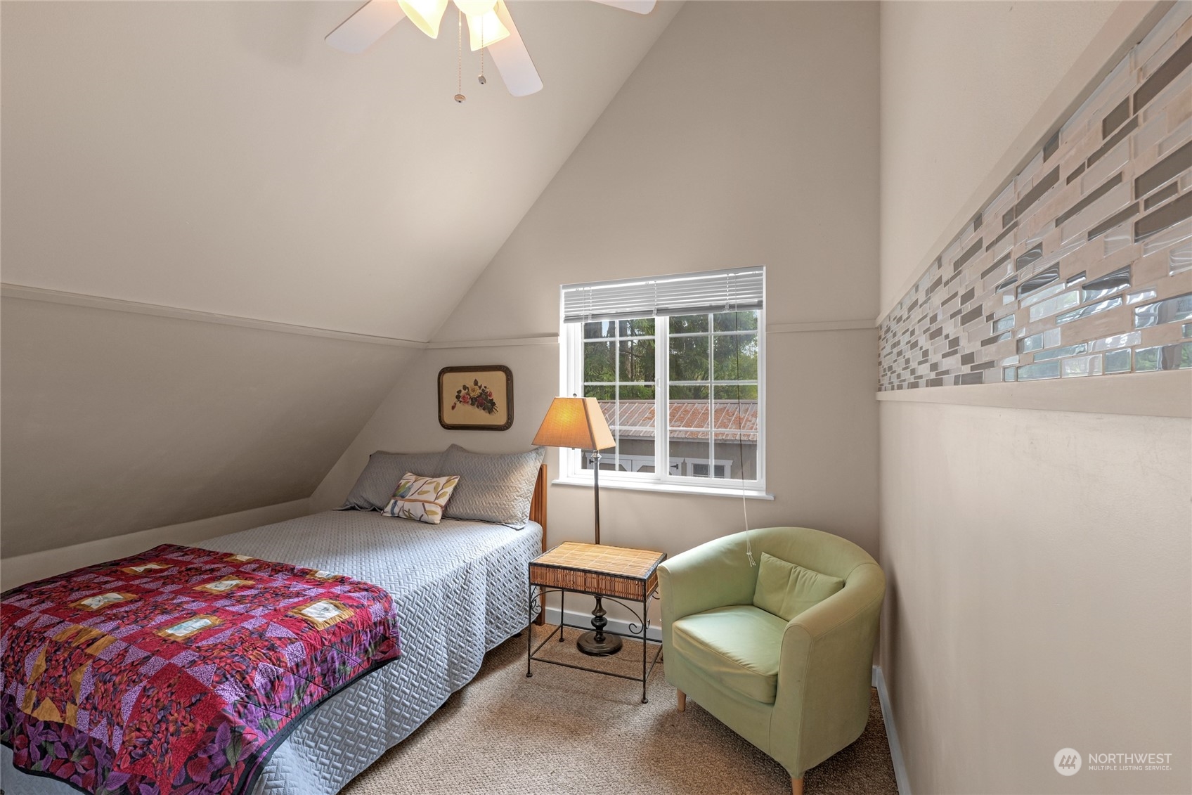 160 East Benson Lake Road Grapeview, WA 98546 - Photo 33 of 34 a bedroom with a bed and a couch