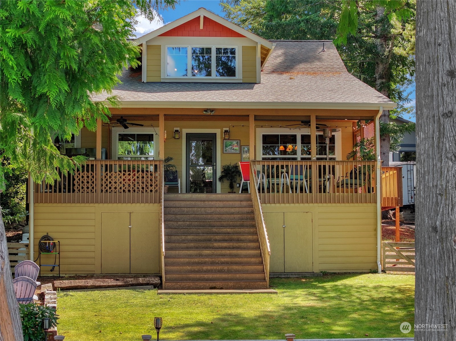 160 East Benson Lake Road Grapeview, WA 98546 - Photo 10 of 34 a front view of a house with a yard