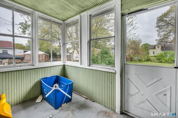 a view of a two chair in the balcony