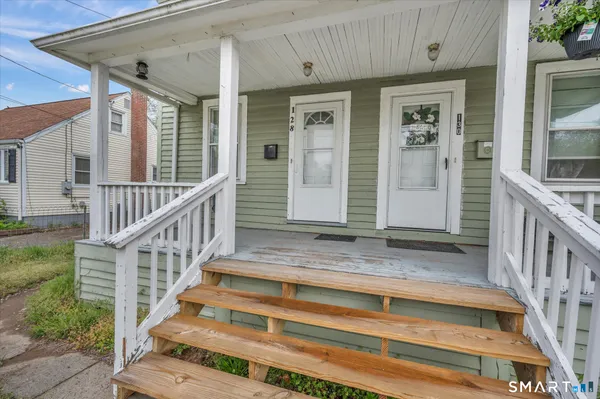 a view of entryway with a front door