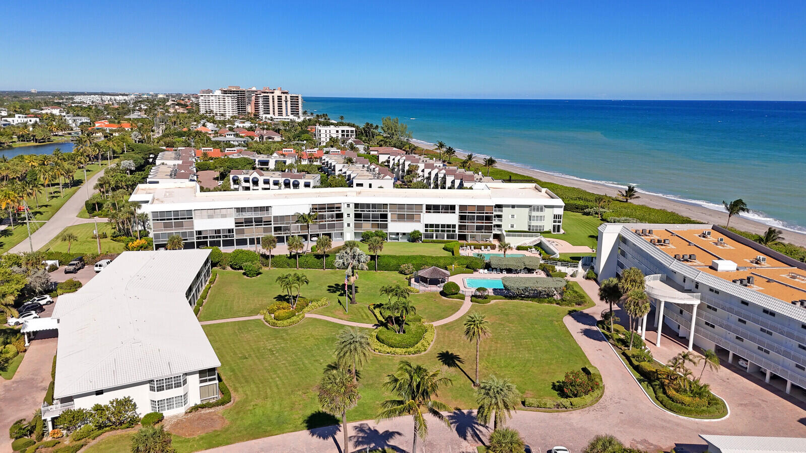80 Celestial Way, Unit 109 Juno Beach, FL 33408 - Photo 34 of 40 an aerial view of a house with a swimming pool