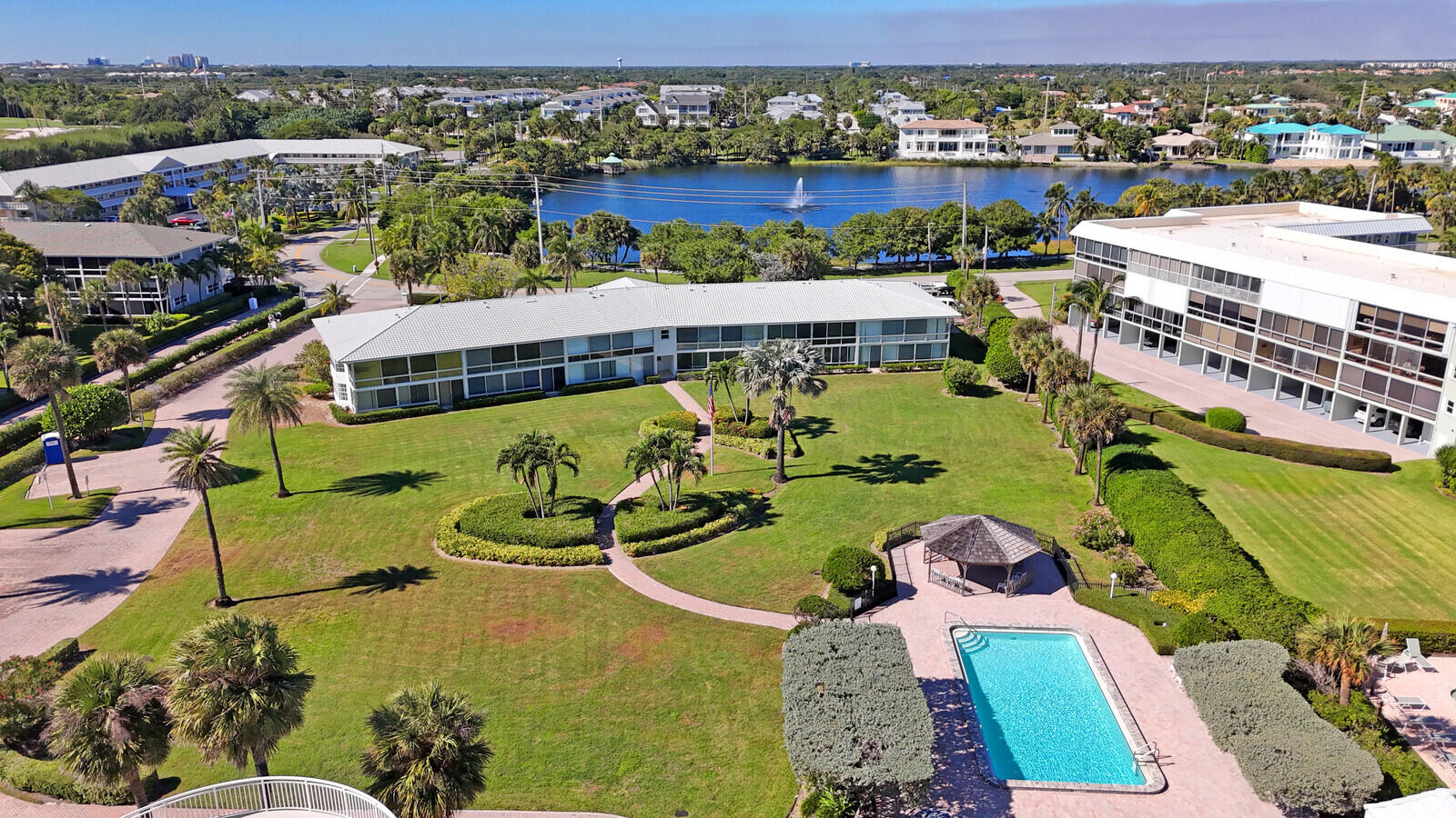 80 Celestial Way, Unit 109 Juno Beach, FL 33408 - Photo 37 of 40 an aerial view of a house with a swimming pool yard and outdoor seating