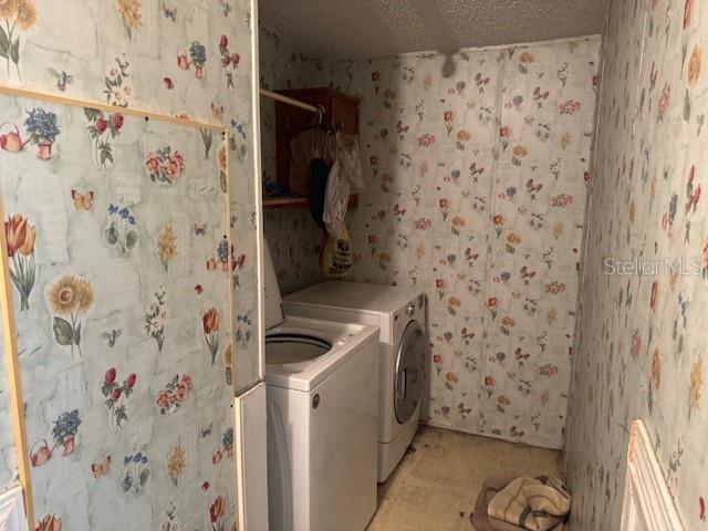 6721 Coronet Road Lakeland, FL 33811 - Photo 21 of 63 a bathroom with a sink and a shower curtain