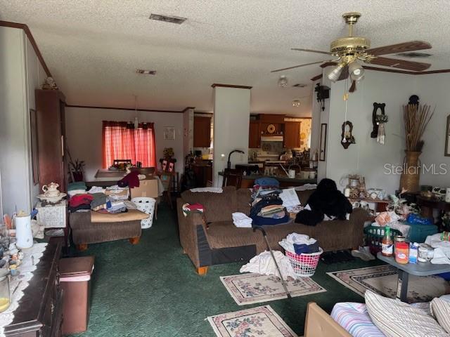 6721 Coronet Road Lakeland, FL 33811 - Photo 4 of 63 a living room with furniture and a chandelier