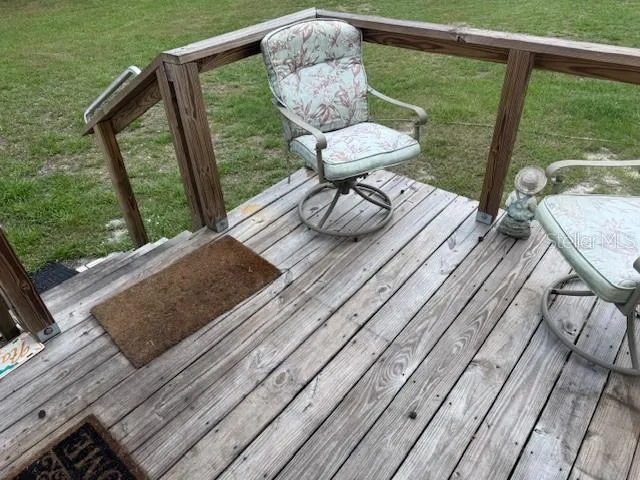 a view of a house with a back yard
