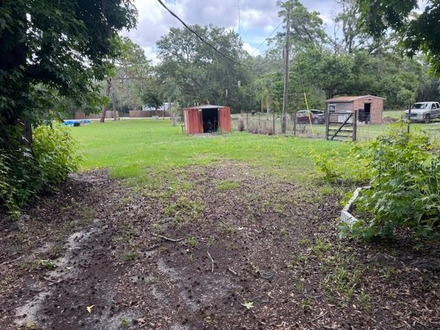 6721 Coronet Road Lakeland, FL 33811 - Photo 52 of 63 a view of a chair and table in the garden