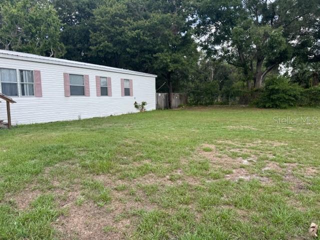 6721 Coronet Road Lakeland, FL 33811 - Photo 55 of 63 a house view with a garden space