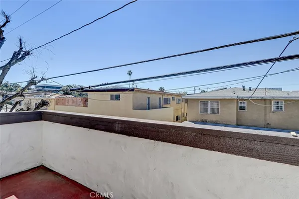 a view of a house with a large space