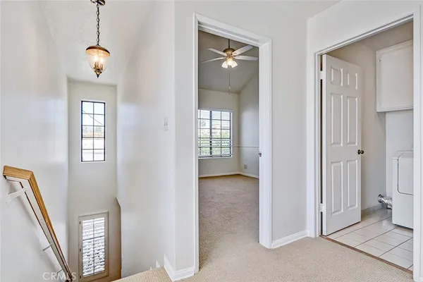 a view of a hallway with front door