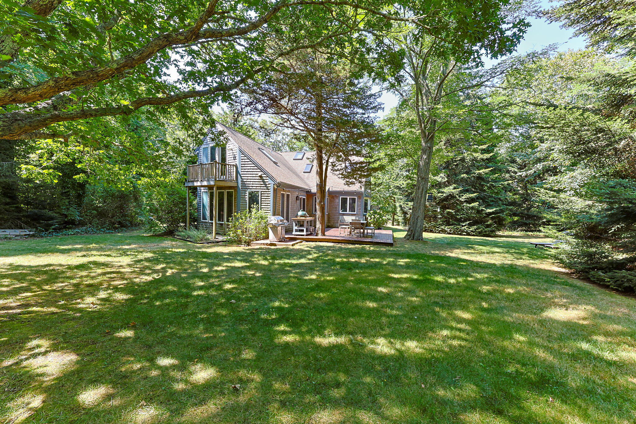 241 Tonset Road Orleans, MA 02653 - Photo 6 of 56 a front view of a house with a yard