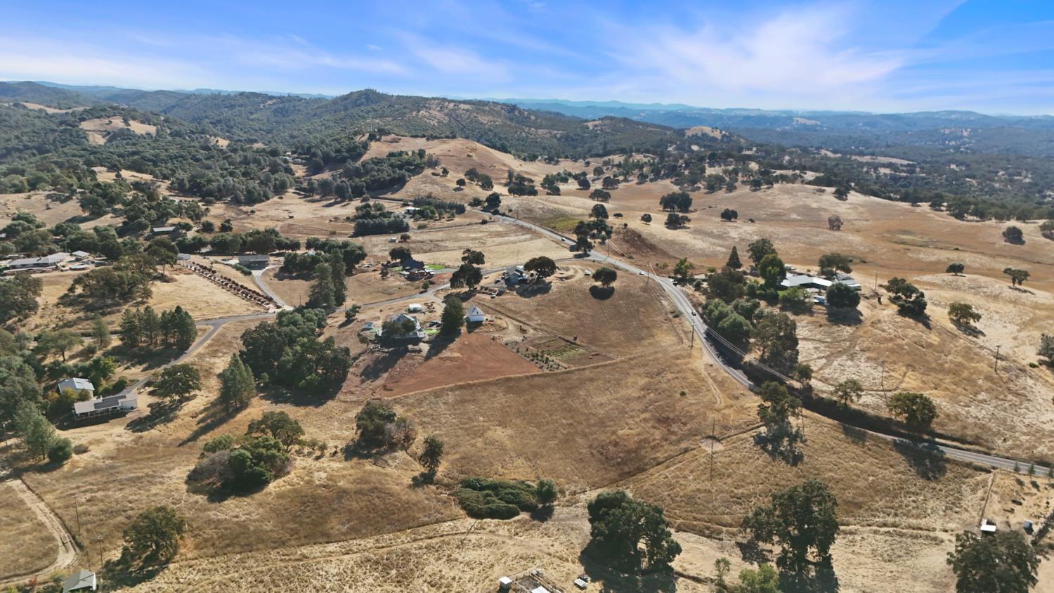 1495 Mountain Ranch Road San Andreas, CA 95249 - Photo 9 of 33 an aerial view of residential houses with outdoor space