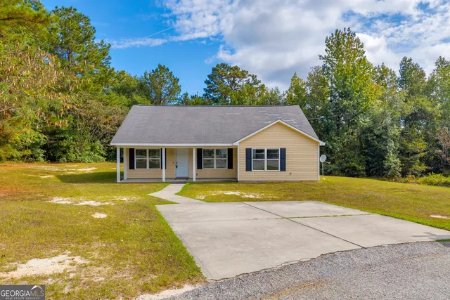 a sign board with an trees