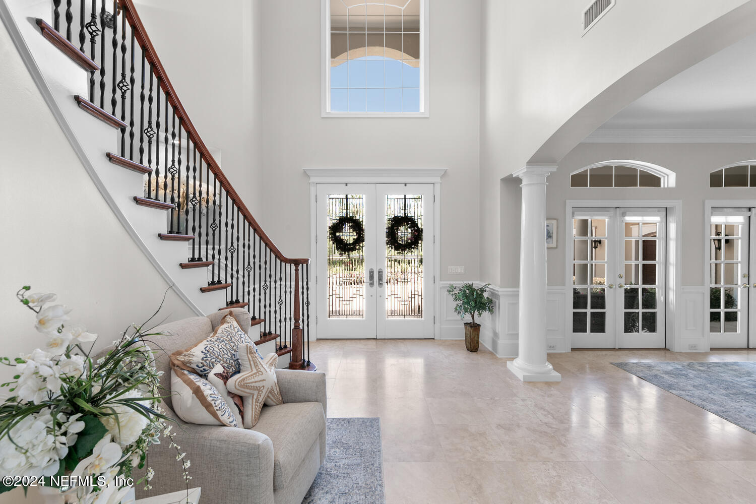 752 Promenade Pointe Drive St. Augustine, FL 32095 - Photo 12 of 117 a view of an entryway with wooden floor