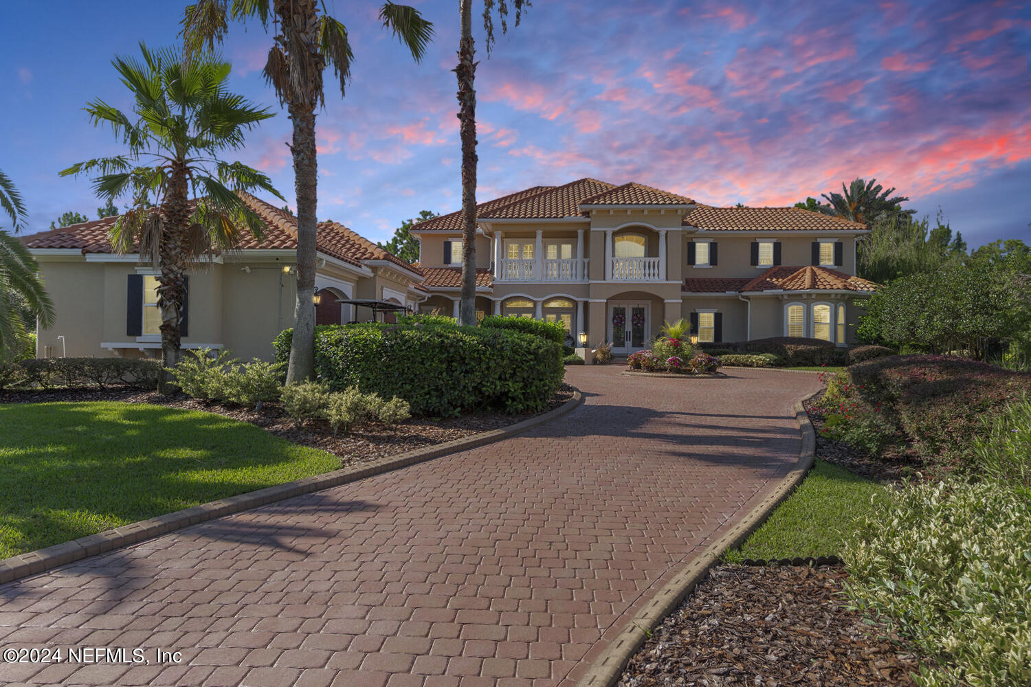 752 Promenade Pointe Drive St. Augustine, FL 32095 - Photo 3 of 117 a front view of a house with garden