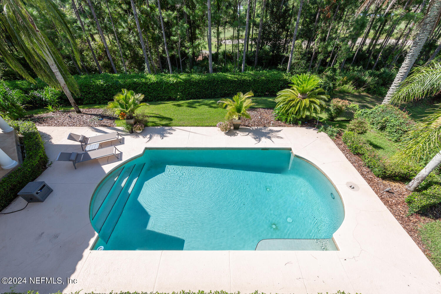 752 Promenade Pointe Drive St. Augustine, FL 32095 - Photo 73 of 117 a view of a swimming pool with a yard