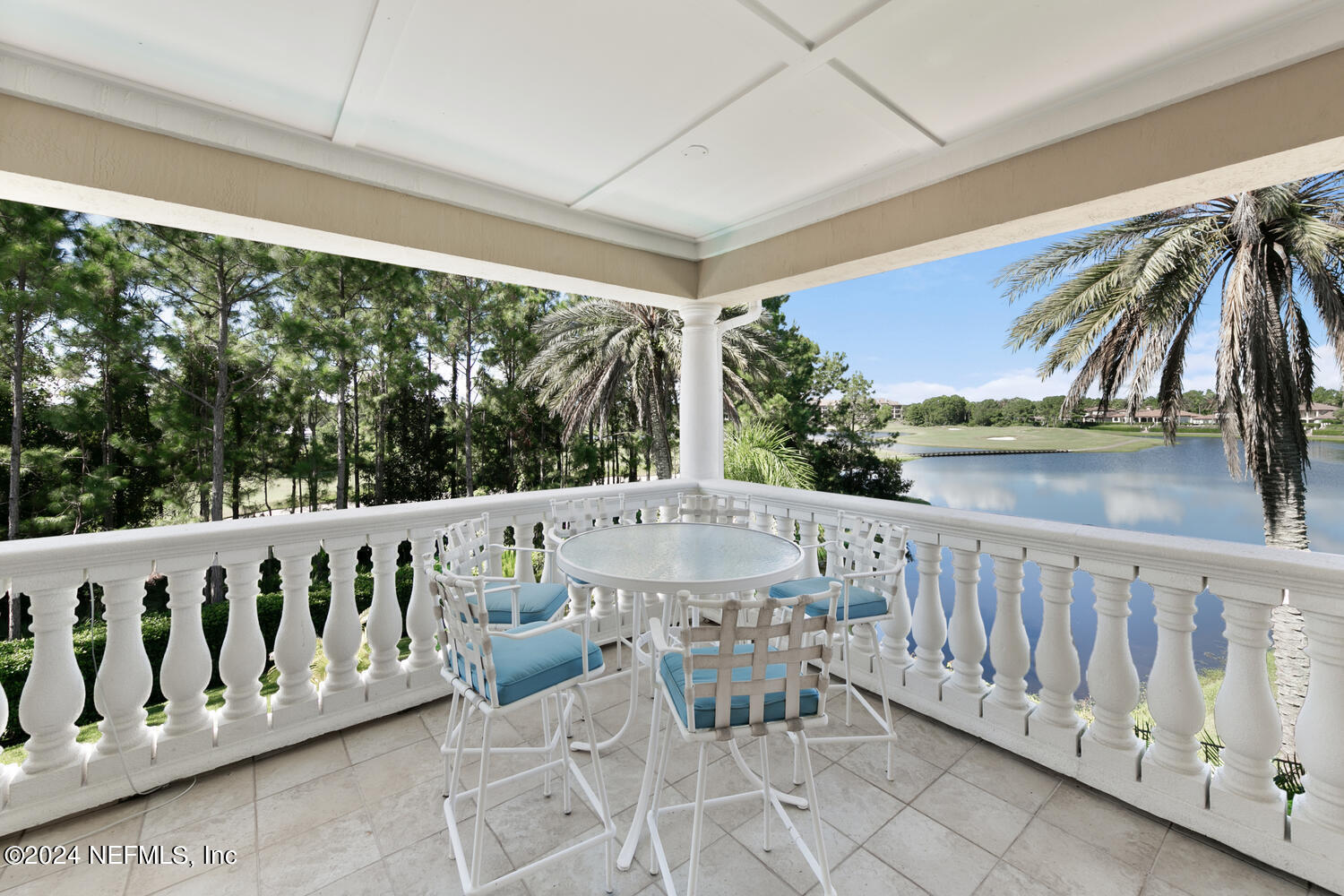 752 Promenade Pointe Drive St. Augustine, FL 32095 - Photo 76 of 117 a view of a patio with a table and chairs