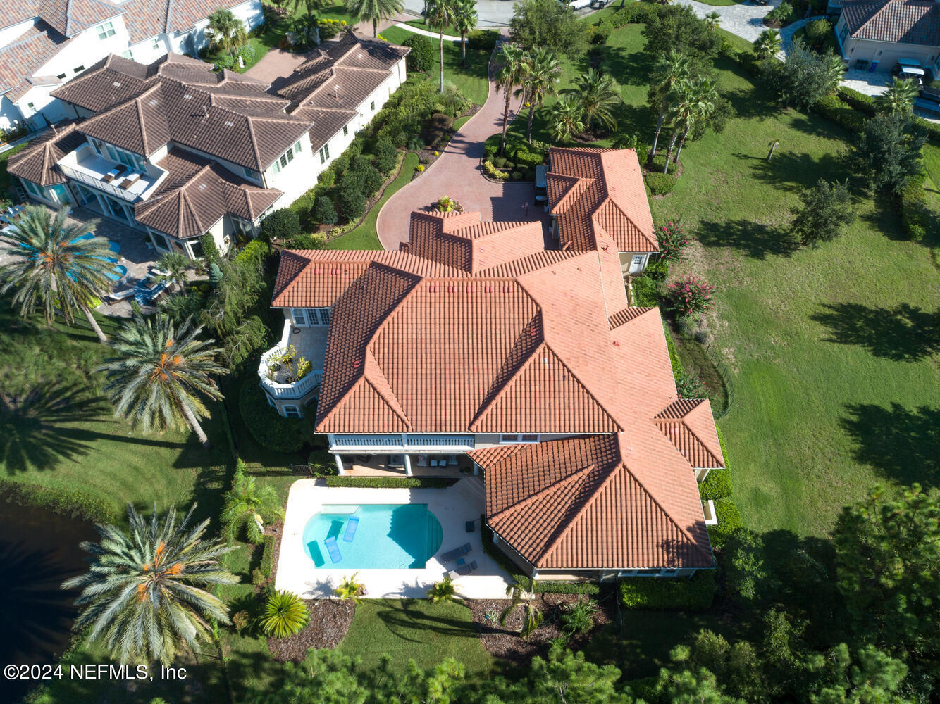 752 Promenade Pointe Drive St. Augustine, FL 32095 - Photo 98 of 117 an aerial view of multiple houses with yard